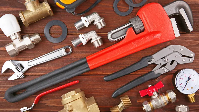 Plumbing tools and pipe wrench used by Fullerton technicians